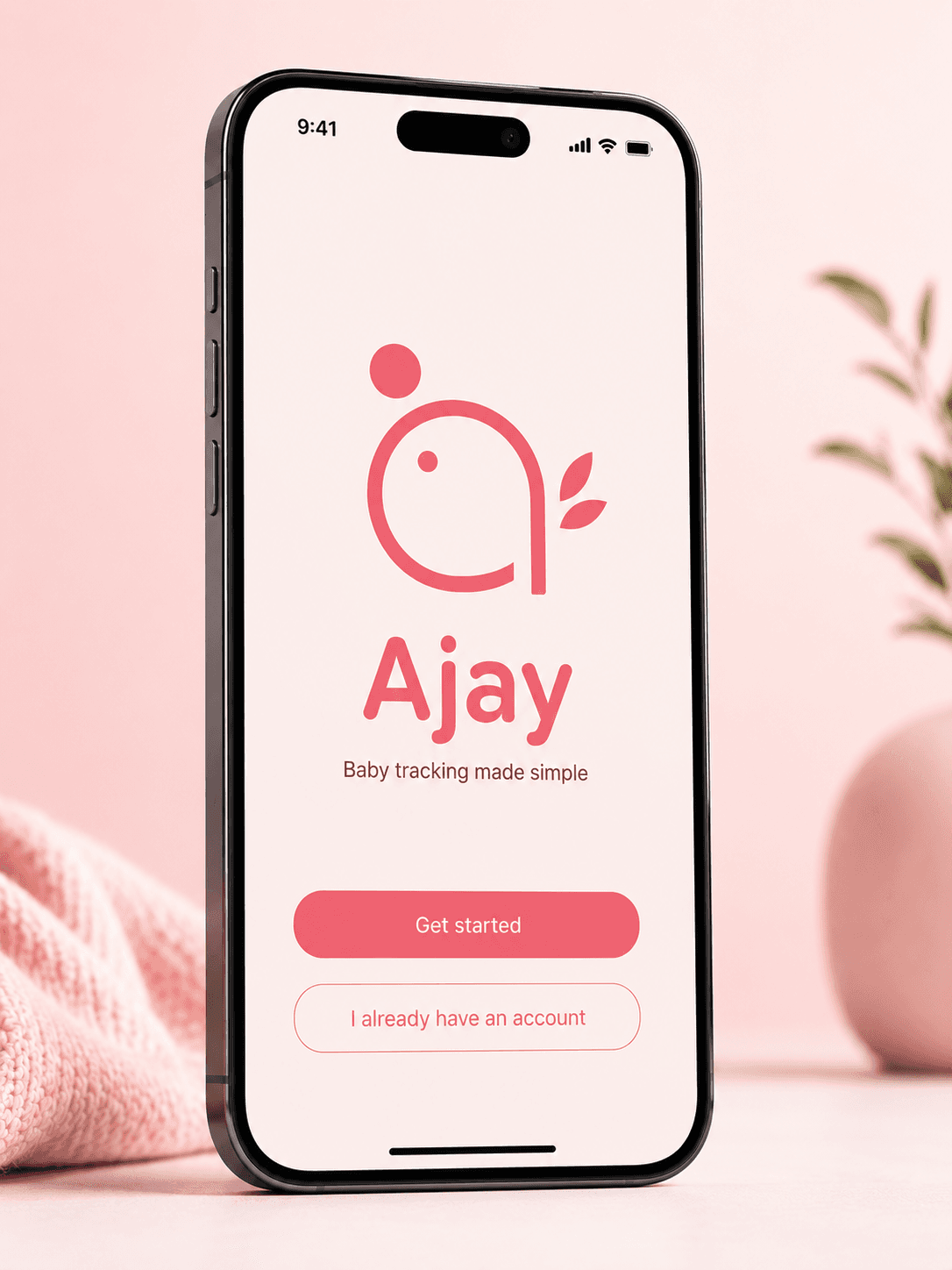 Ajay app welcome screen shown on a phone mockup with a pink jay bird logo and baby tracking made simple tagline.